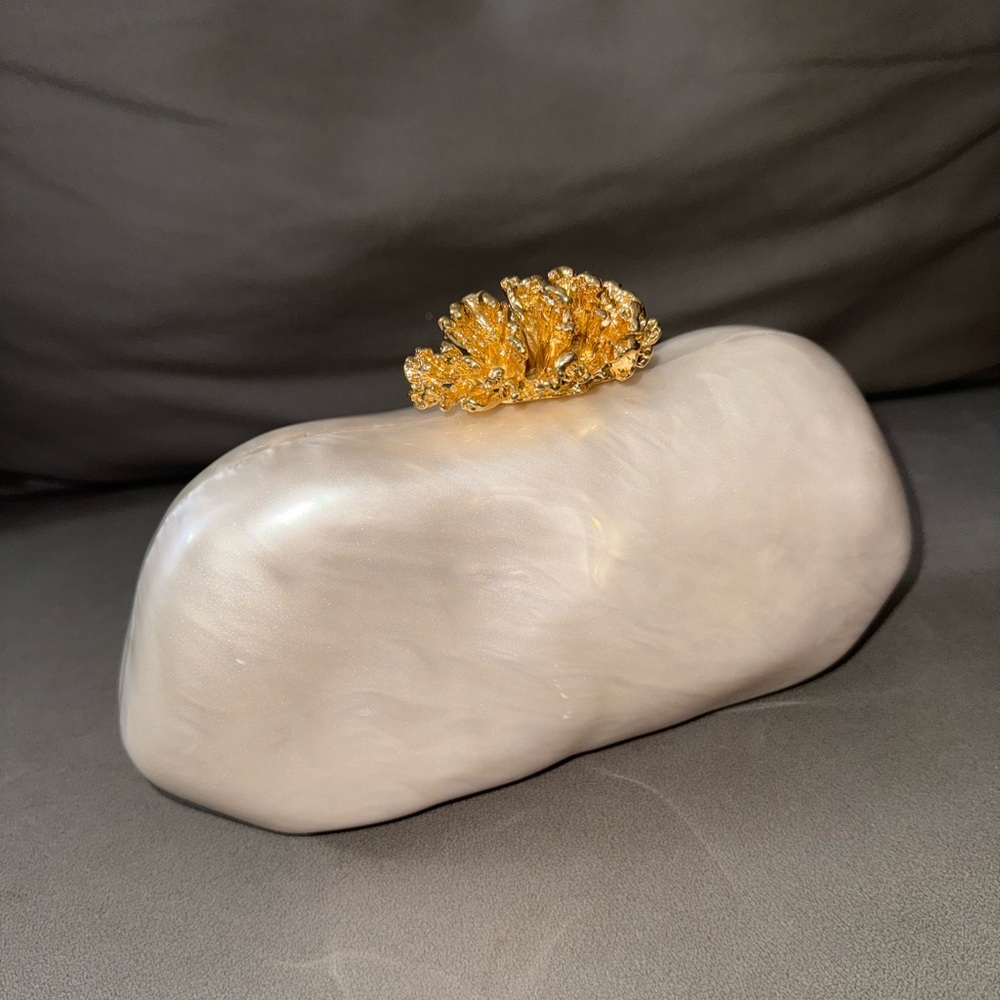 Elegant Pearl White Clutch with Gold Accent